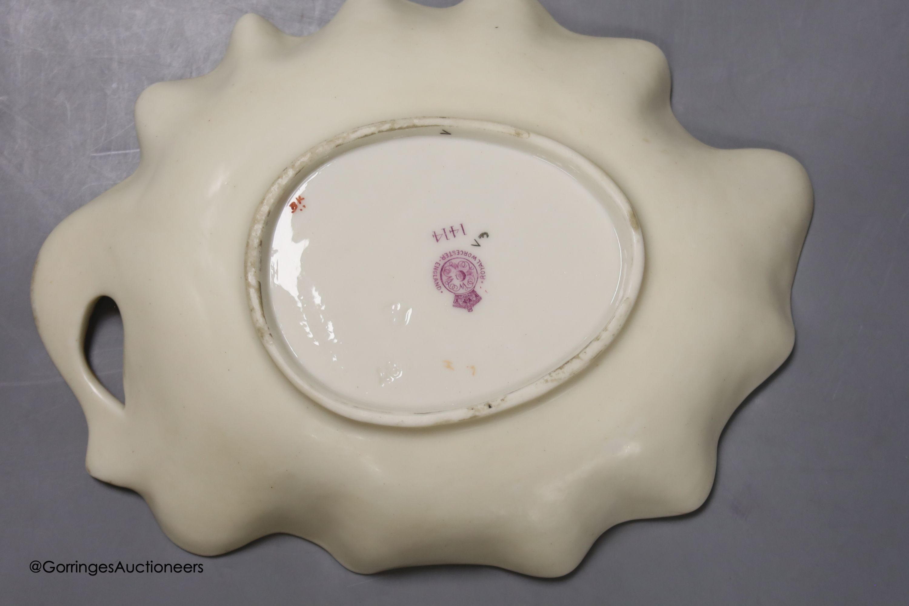 A Royal Worcester blush leaf dish, a pair of ewers, a two handled vase and another